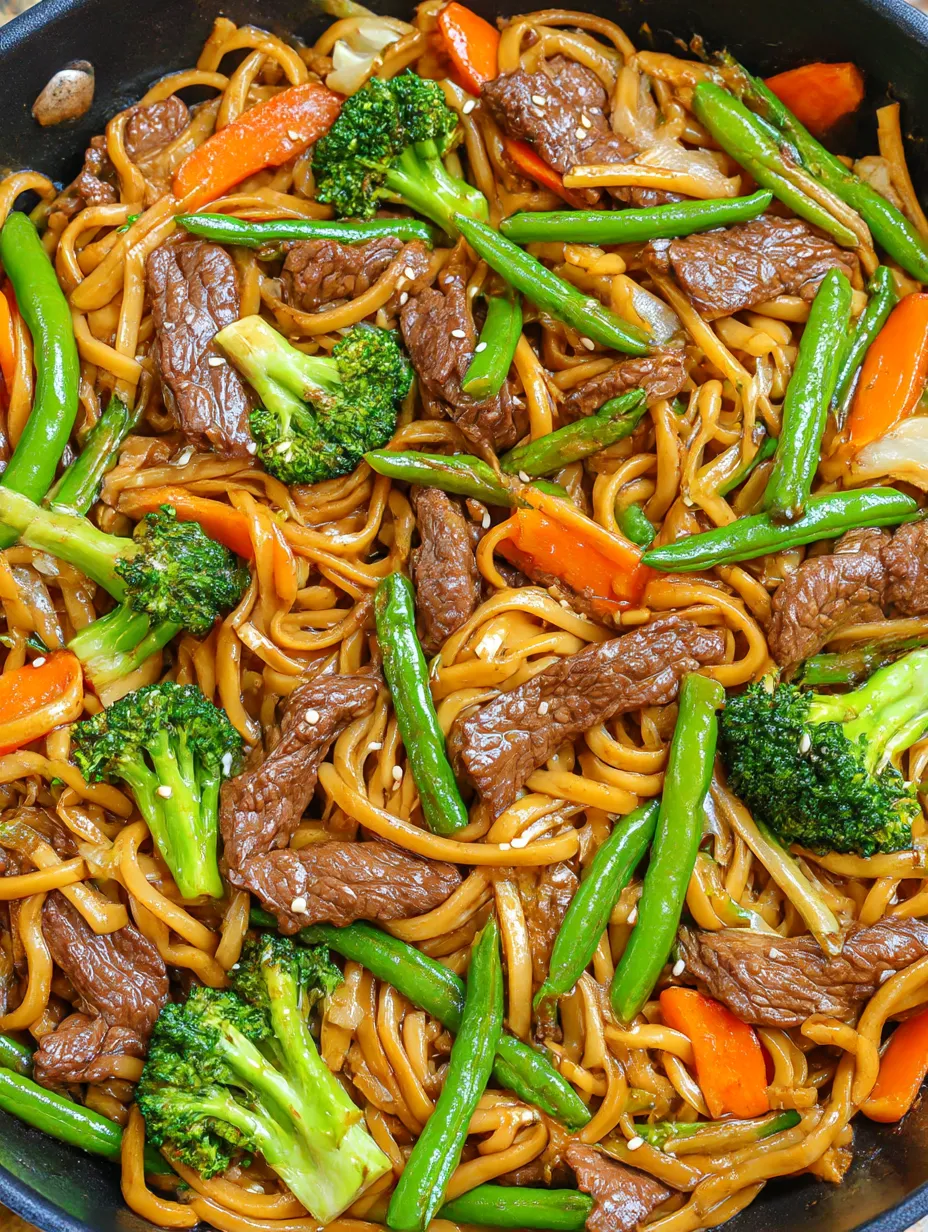 A close up of a homemade beef and broccoli lo mein.