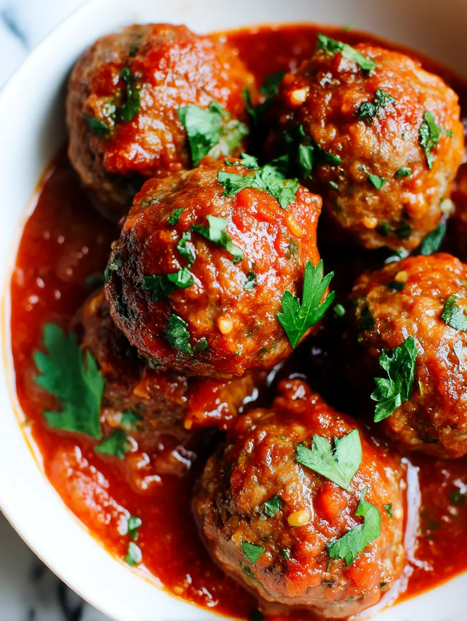 A bowl of Italian meatballs in tomato sauce.
