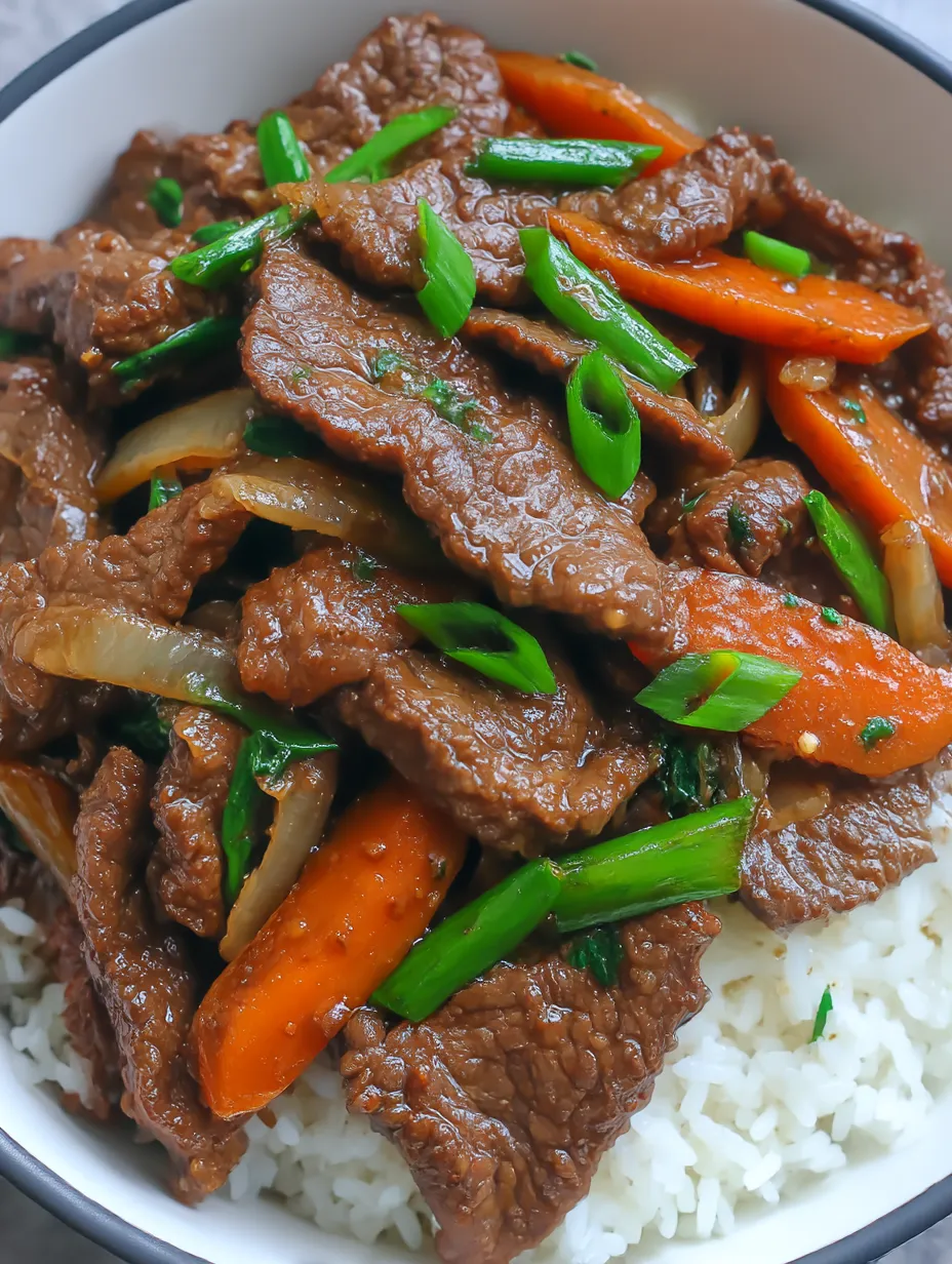 A close up of a Chinese beef and onion stir fry.