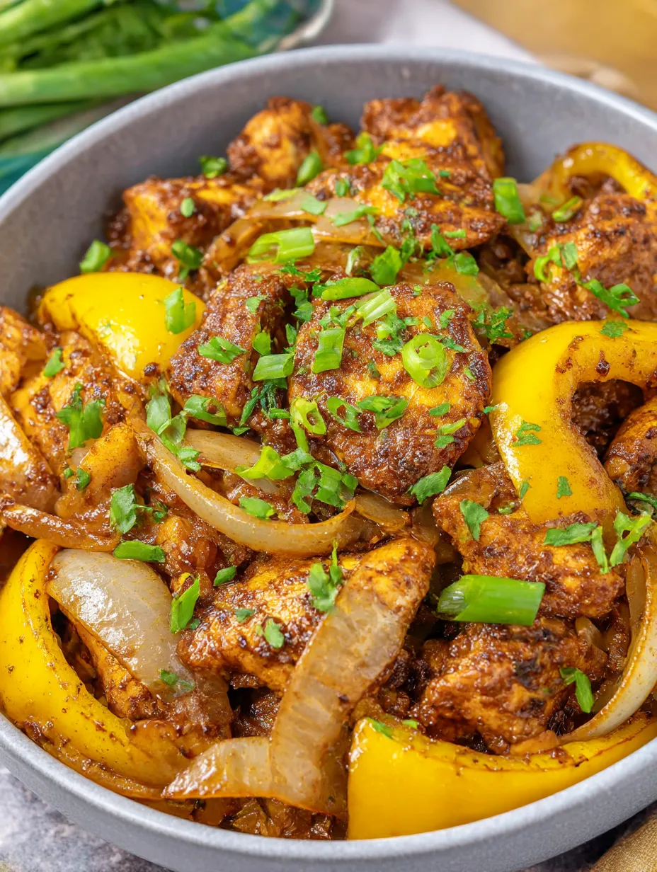 A bowl of Chinese black pepper chicken stir fry.