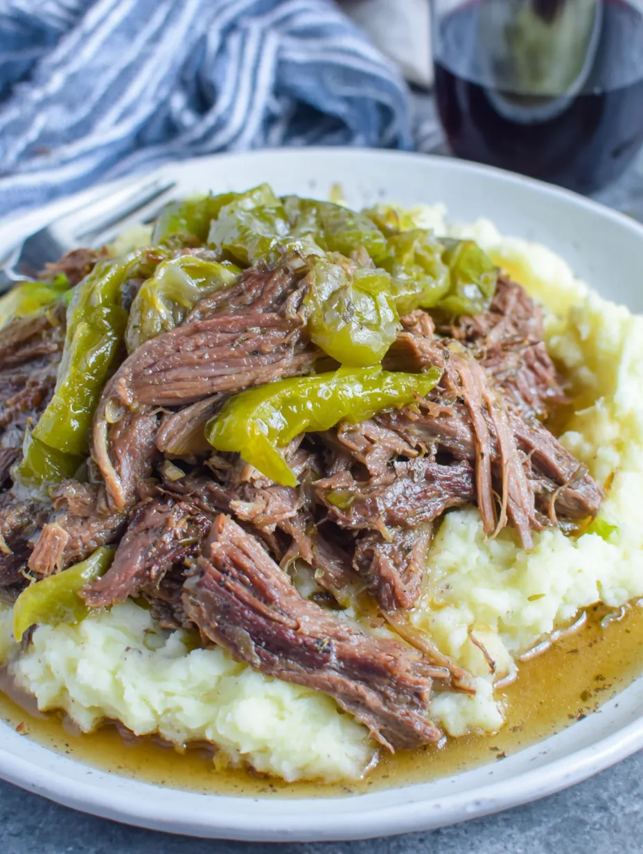 A plate of food with meat and potatoes.