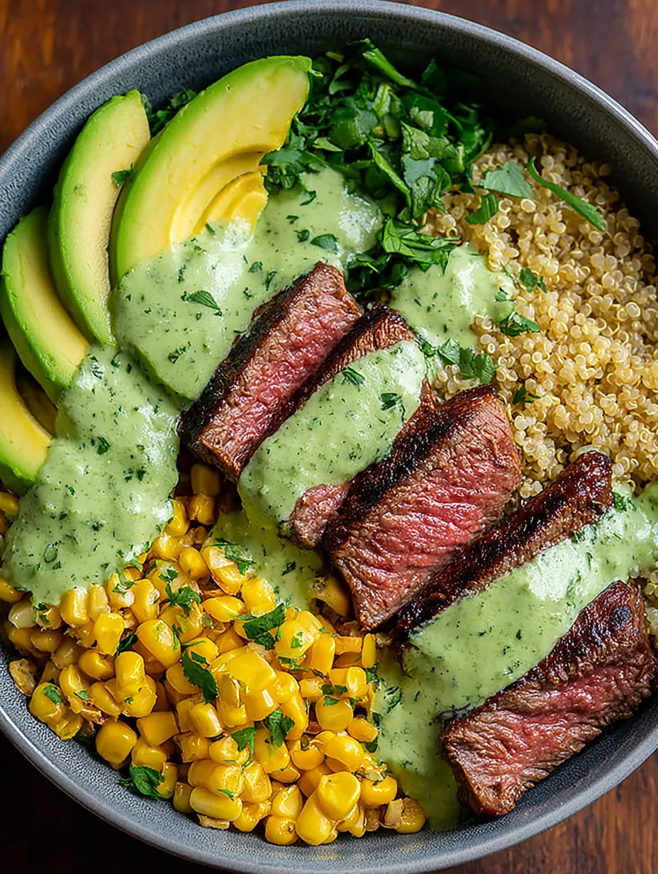 A bowl of food with meat, avocado, and rice.