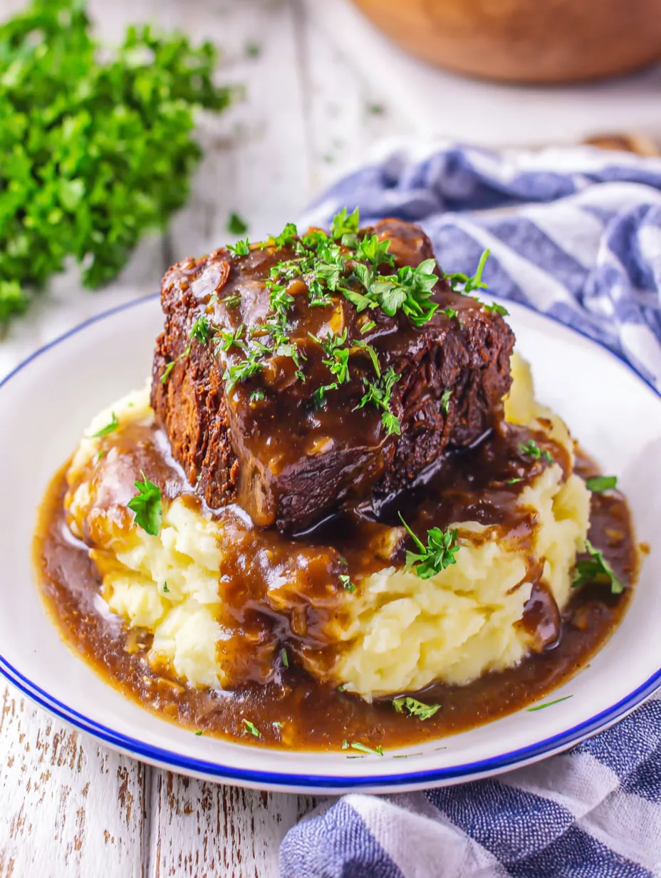 A plate of meat and potatoes.