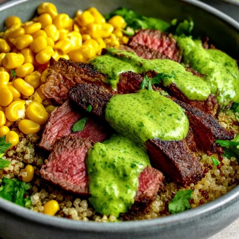 A bowl of food with meat, corn, and avocado.