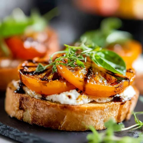 A slice of garlicky ricotta tomato toast.