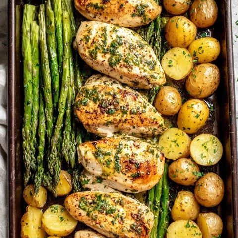 A pan of chicken and potatoes.