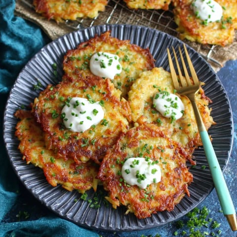 A plate of food with a fork on it.
