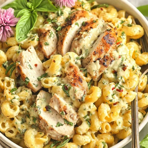 A bowl of cheesy herb chicken.